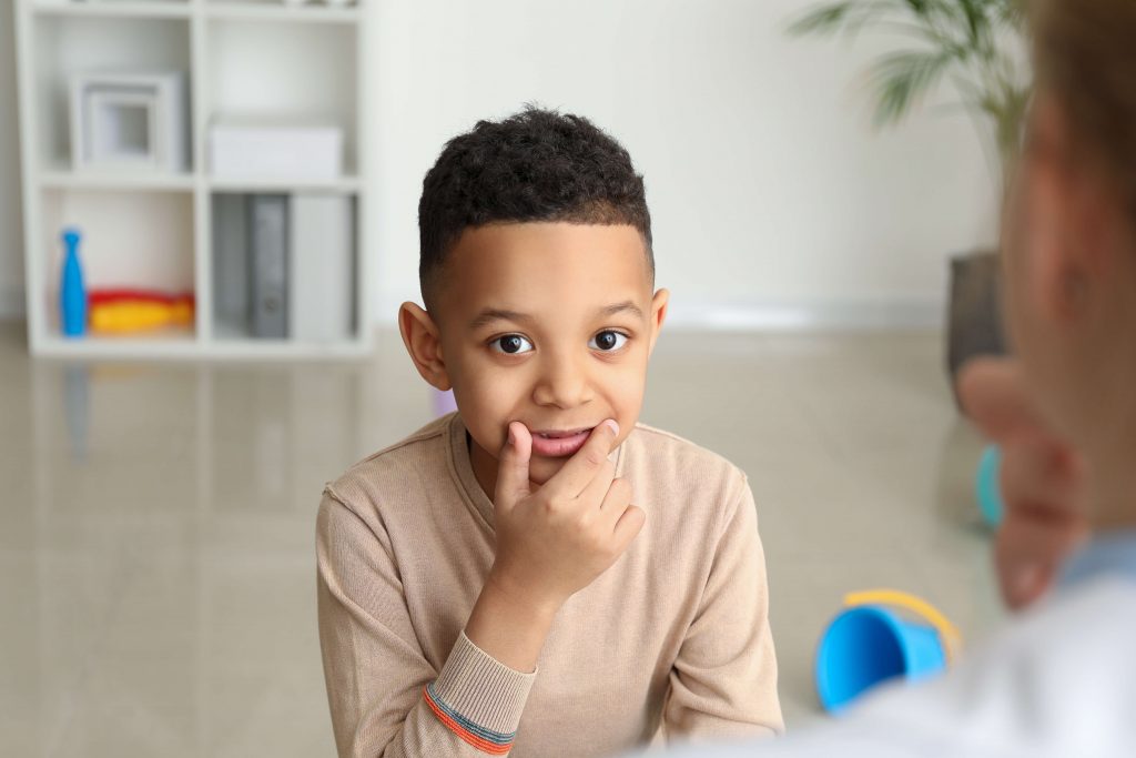 Child doing speech therapy